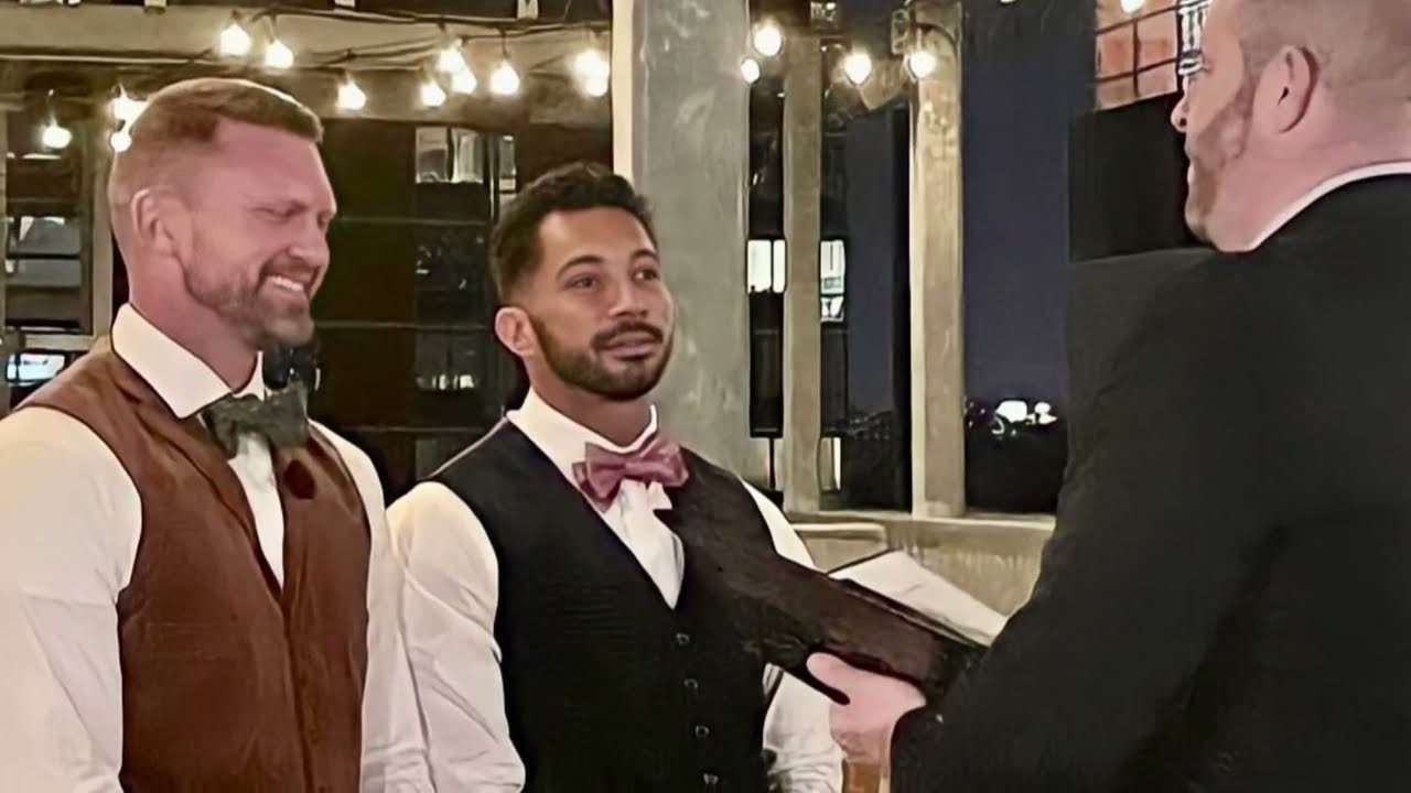 Jim officiating for two grooms
