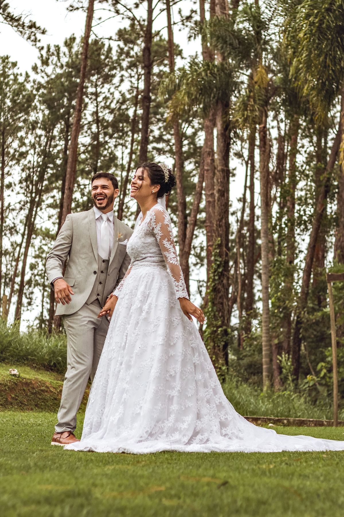 A bride and groom laughing together